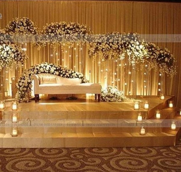 ایده طراحی سن تالار عروسی با استفاده از گل